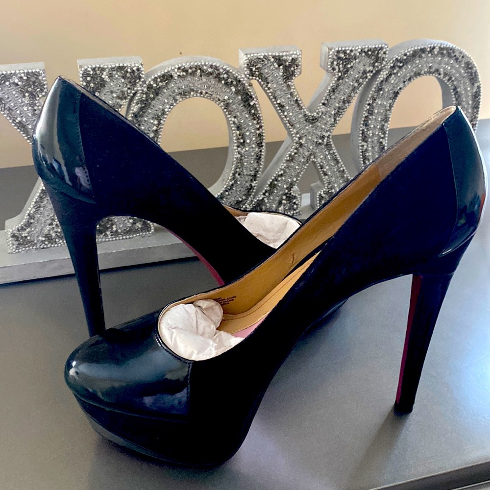 Paris Hilton black platform high heels probably wore 2 times